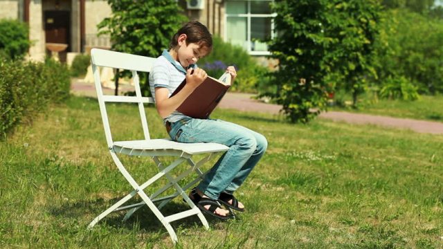Boy on park bench